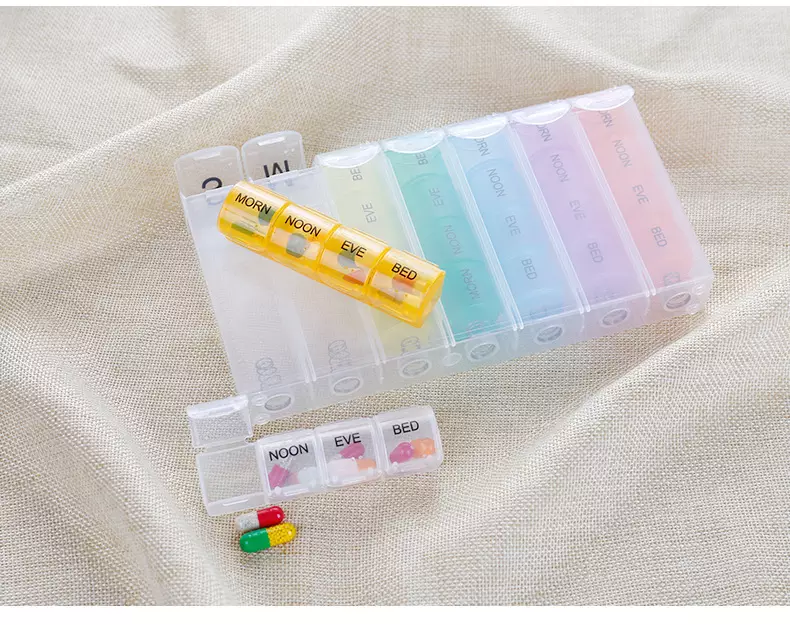 transparent pop-up pill organizer